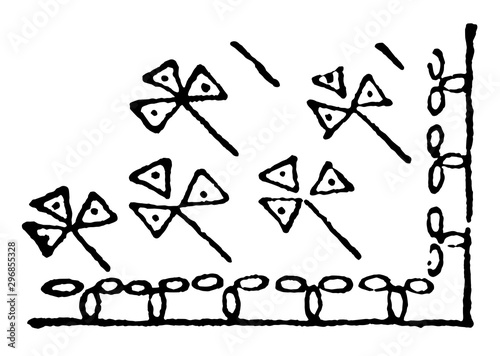 Rhodian or Lily Design is a Composed of small flowers with three triangular petals vintage engraving.