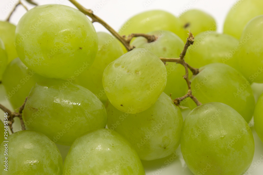 This is a photograph of Green Grapes isolated on a White background This is a photograph of Green Grapes isolated on a White background