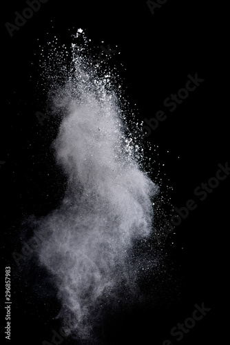 Explosion of colored powder isolated on black background. Abstract colored background. holi festival. © piyaphong