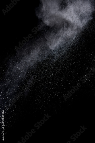 Explosion of colored powder isolated on black background. Abstract colored background. holi festival.