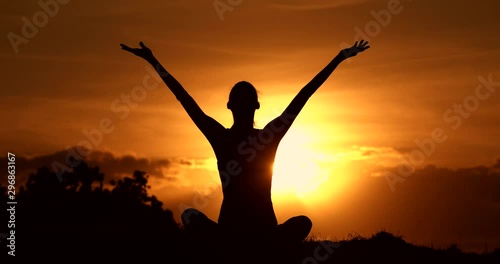 Wallpaper Mural Happy woman raising arms up at sunset feeling free.  Torontodigital.ca