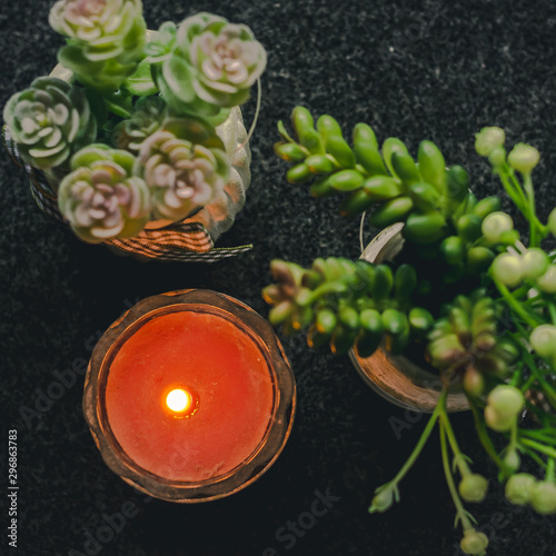 Vela y flores