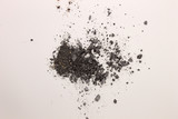 This is a photograph of Gray powder Eyeshadow isolated on a White background