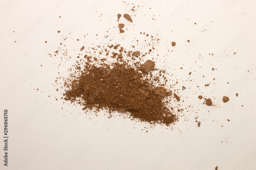 This is a photograph of a Bronzer powder makeup isolated on a White background