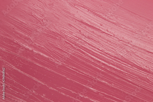 This is a photograph of a Pink Lipstick swatch background
