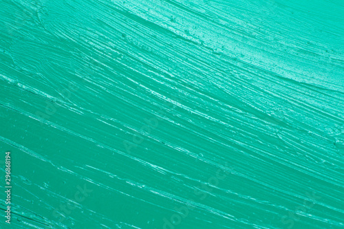 This is a photograph of a Metallic Teal Lipstick swatch background