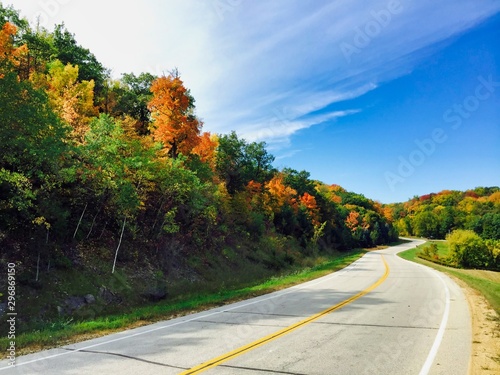 View looking down a country road in the fall/autumn in the Midwest