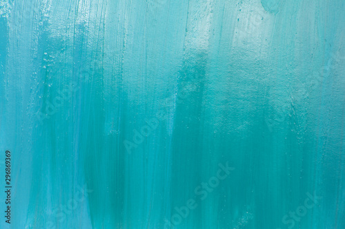 This is a photograph of a Turquoise Lipstick swatch background