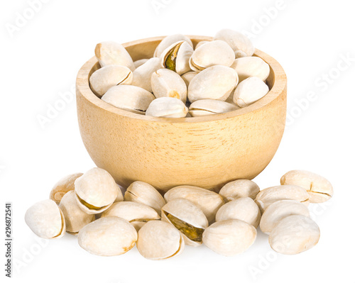 A bowl of pistachios on white background.