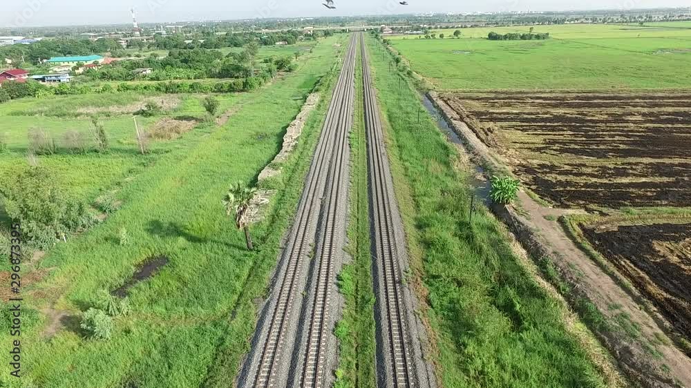 aerial view from flying drone of railroad tracks, train aerial view from flying drone of railroad tracks, train