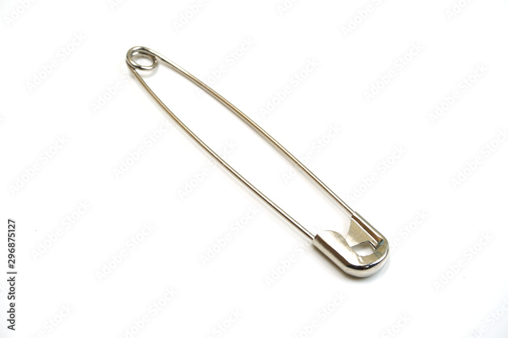 metal safety pins isolated on white background metal safety pins isolated on white background