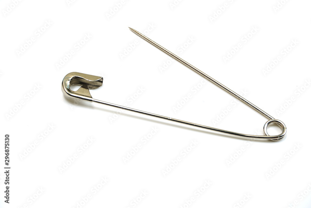 metal safety pins isolated on white background metal safety pins isolated on white background