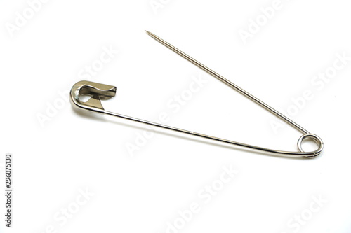 metal safety pins isolated on white background