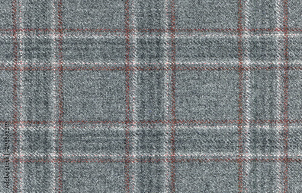 Fototapeta premium Grey Glenurquhart check is made of woolen fabric. Herringbone tweed, Wool Background Texture. Coat close-up. Expensive men's suit
