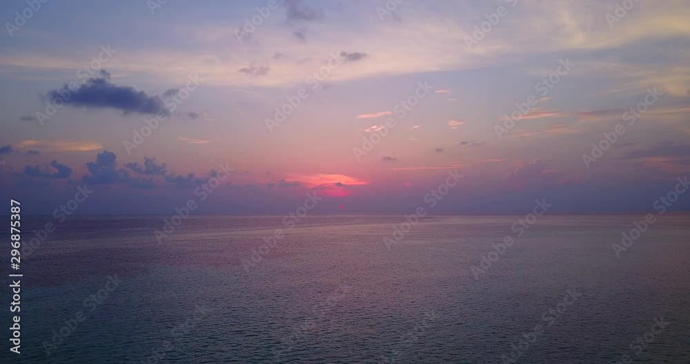 Static view of fabulous sunset with red violet colors, endless ocean pan, near Three Kings Islands Static view of fabulous sunset with red violet colors, endless ocean pan, near Three Kings Islands