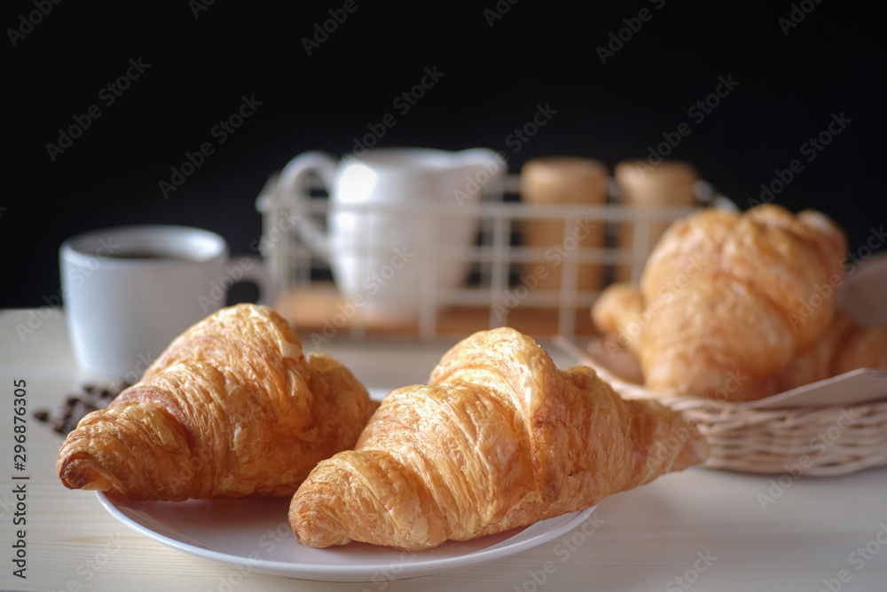 Fresh croissant. Freshly baked croissants with a cup of espresso. Tasty croissants.