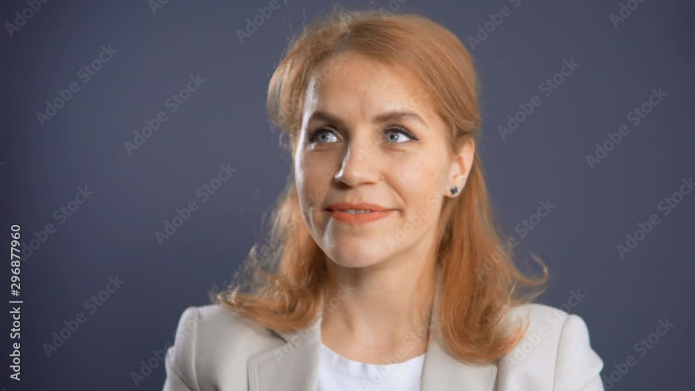 portrait adult businesswoman showing hand gesture have idea successful manager in elegant suit smiling