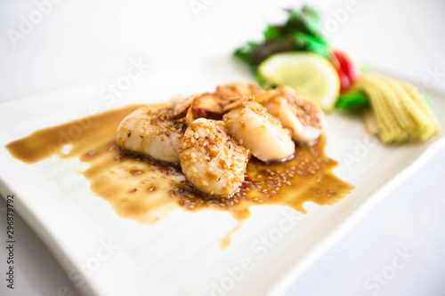 Grilled scallops with mushroom sauce and side dish