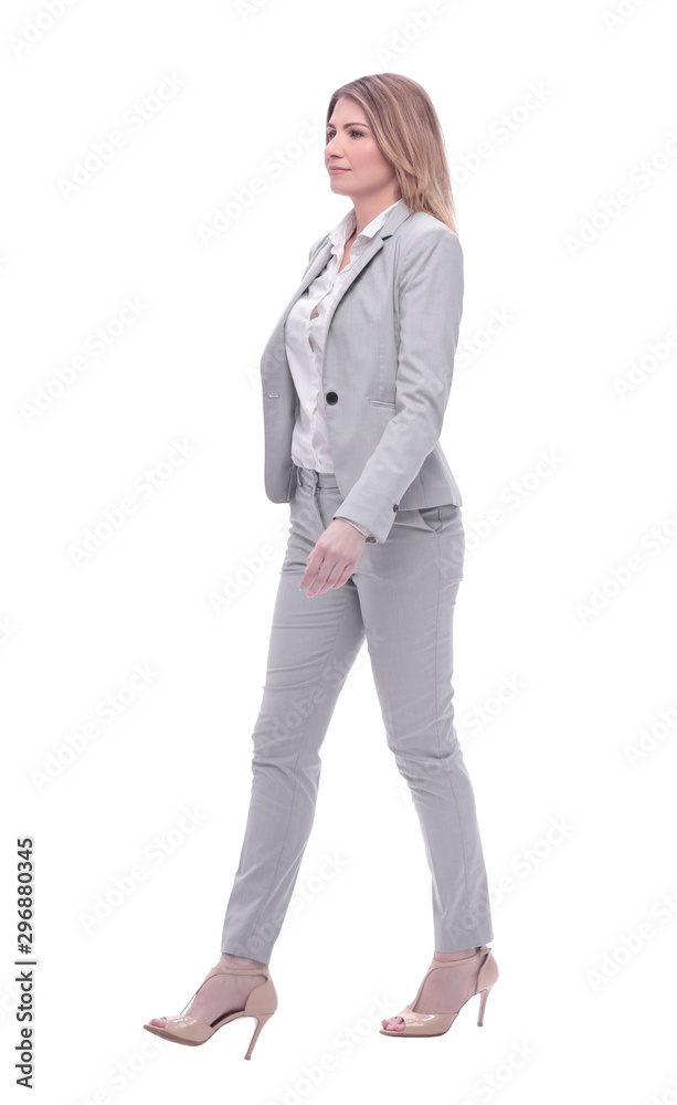 in full growth. confident young business woman in full growth. confident young business woman
