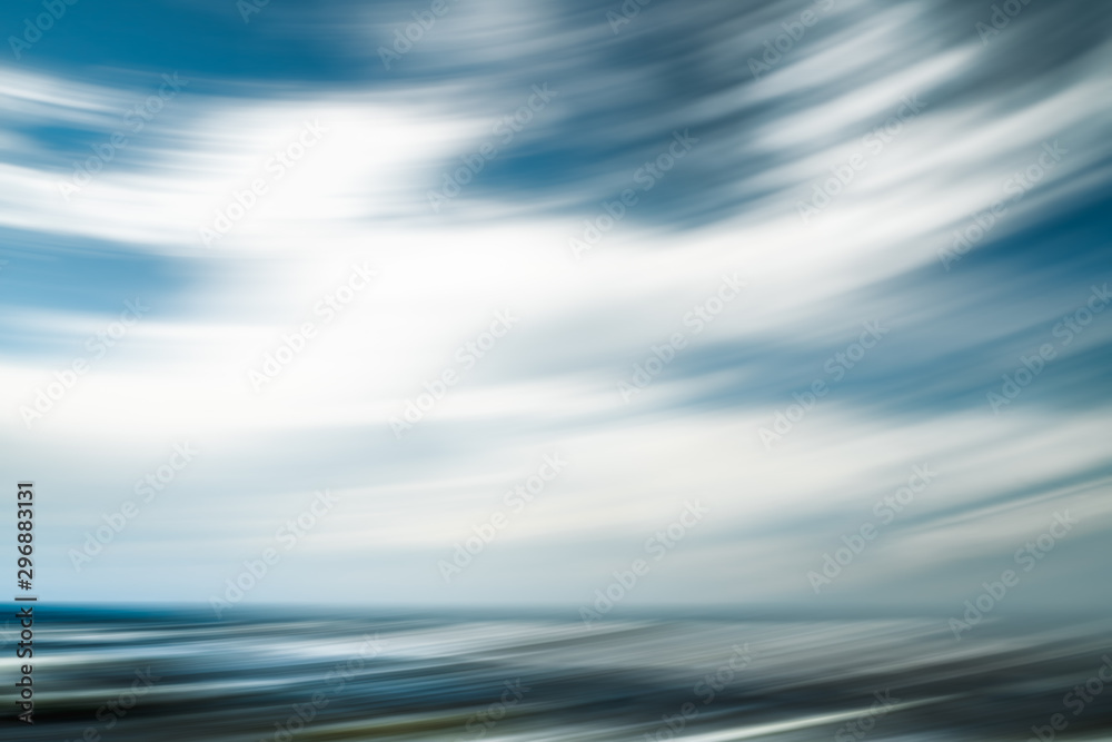 Breezy weather abstract. Cloudy sky and ocean view. Line art, motion blur, blue, turquoise colors Breezy weather abstract. Cloudy sky and ocean view. Line art, motion blur, blue, turquoise colors