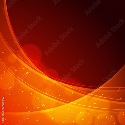 Shiny orange waves on abstract background. photo