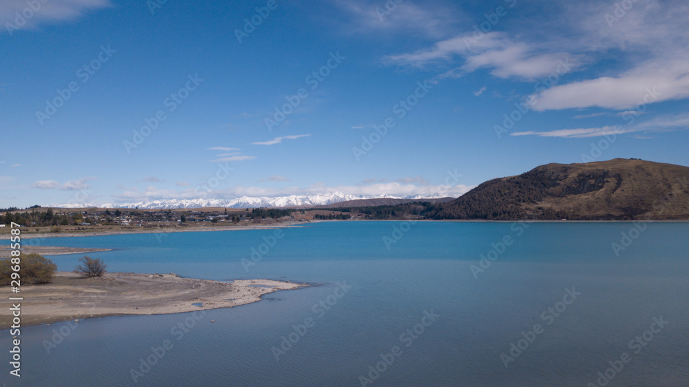 Lake Tekapo aerial view during sunny day.