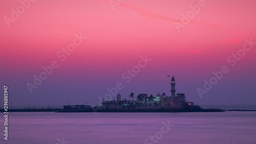 Zooming Out Footage of Mumbai's Famous Haji Ali Dargah during a Beautiful Colorful Sunset photo
