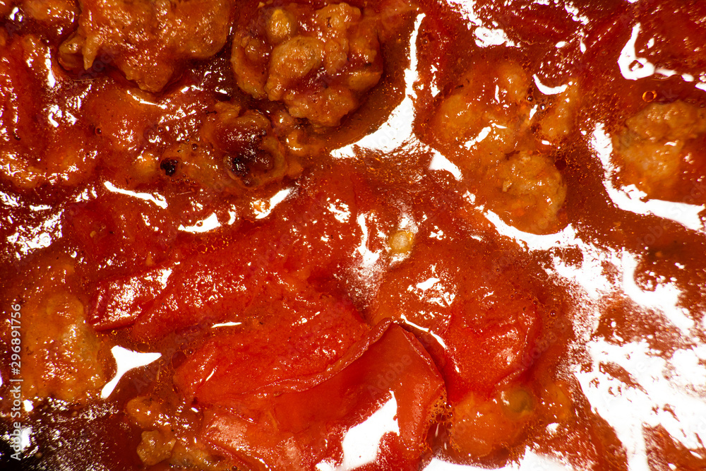 Meat in tomato sauce, soft focus Meat in tomato sauce, soft focus