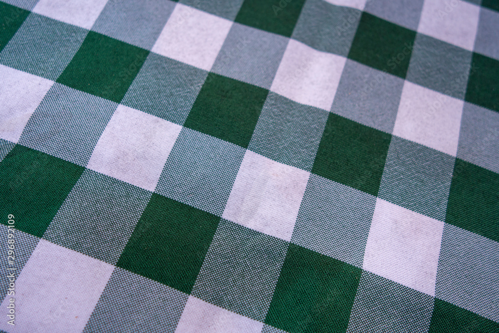 Checkered white and green table cloth