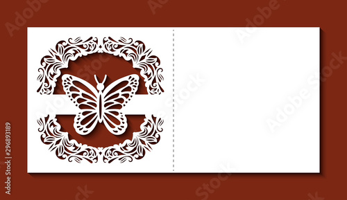 Fotografija Laser cut template of wedding invitation with butterfly and ornate frame