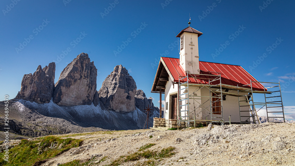 Stunning Tre Cime peaks and Chiesetta Alpina, Dolomites, Italy