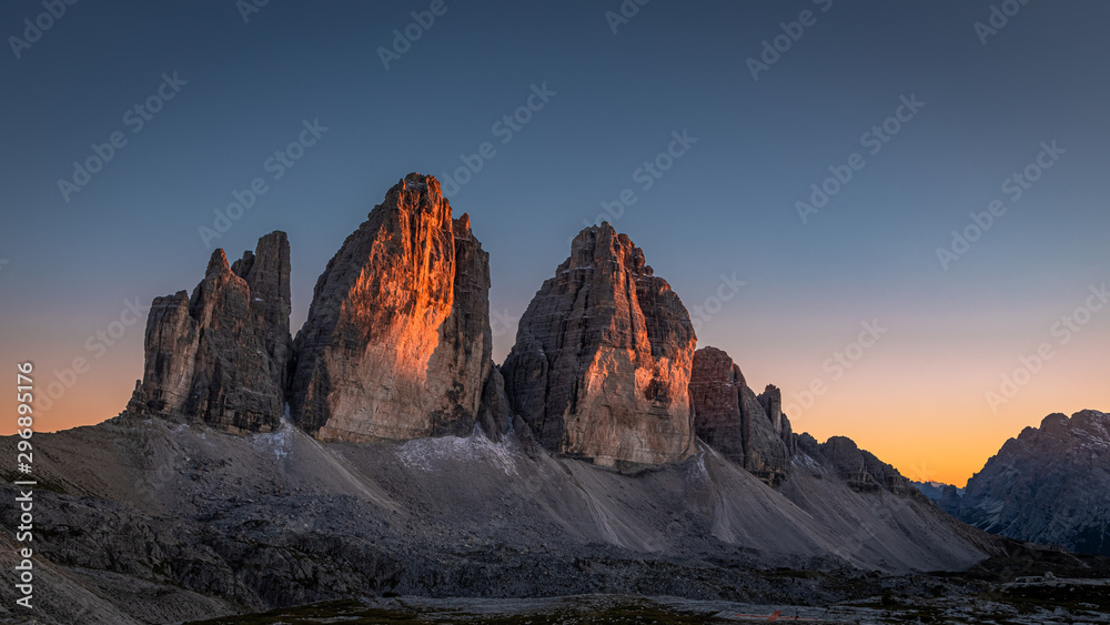 Beautiful view to Tre Cime peaks at sunset, Dolomites, Italy