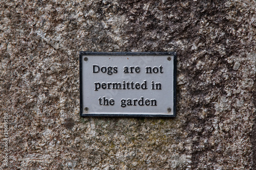 Dogs Are Not Permitted In The Garden sign