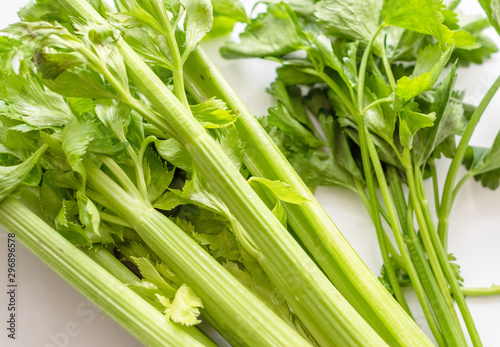 celery stalks on white background. fresh green celery. 