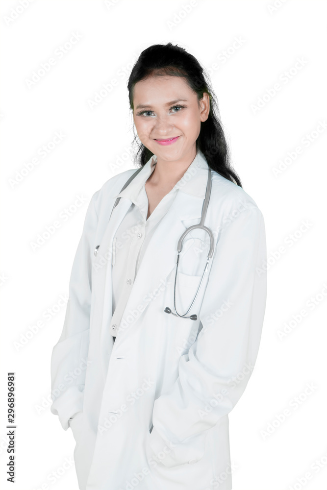Confident female doctor standing in the studio Confident female doctor standing in the studio