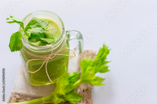 fresh celery juice in a jar. concept of healthy food and detox. Selective focus.
