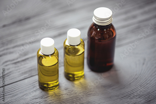 Aromatherapy oil in a bottles on the table.