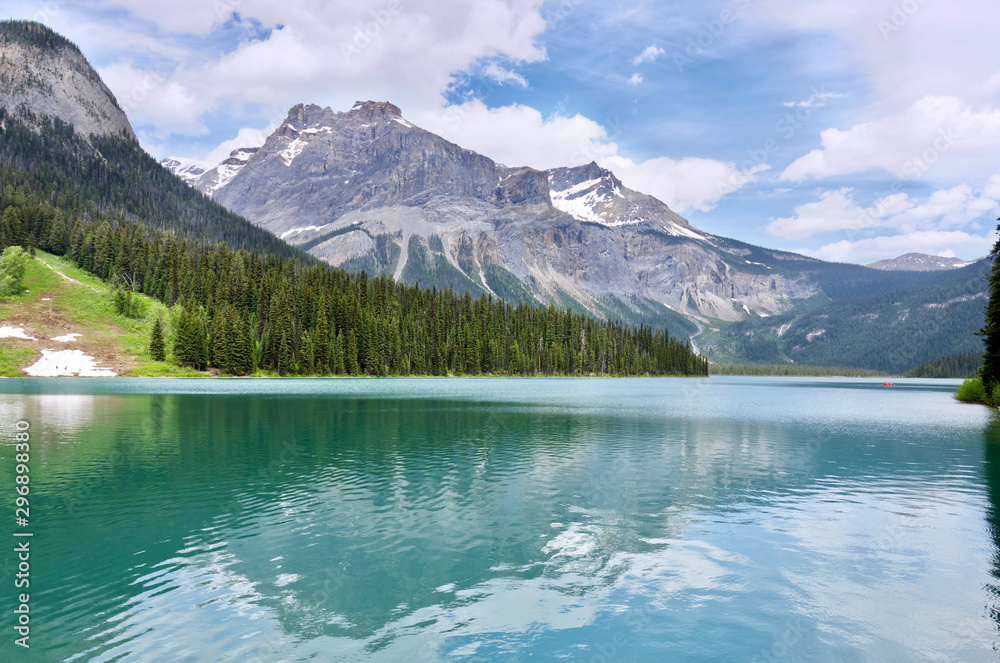 Famous Emerald Lake, Yoho National Park, British Columbia, Canada. Turquoise water and green trees Famous Emerald Lake, Yoho National Park, British Columbia, Canada. Turquoise water and green trees