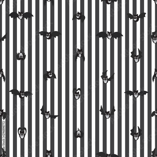 Seamless cartoon bat vector pattern on striped background.