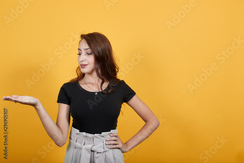 Confident lady presenting something in front of her boss. She is explaining veru well as she is confident and prepared and her charm is on fire. photo