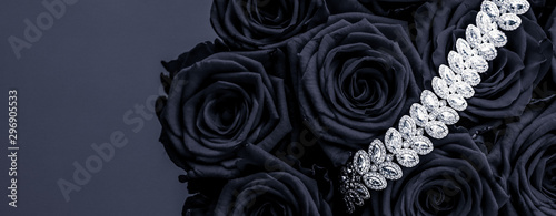 Fényképezés Luxury diamond jewelry bracelet and black roses flowers, love gift on Valentines