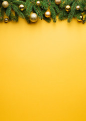 Christmas decoration border on yellow background