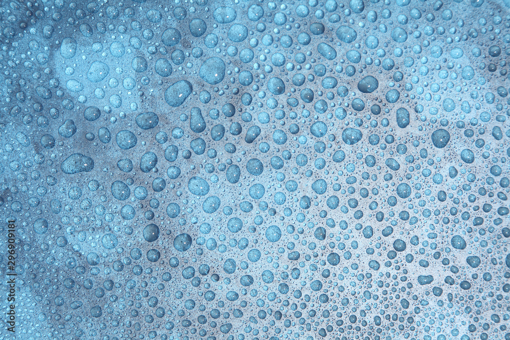 Close up water drops on blue background, Water drop in macro photography Close up water drops on blue background, Water drop in macro photography