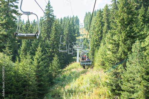 Chair lift, hiking, pine tree forest, green nature, grass foliage, Balkans,, Bulgaria, eastern Europe, people