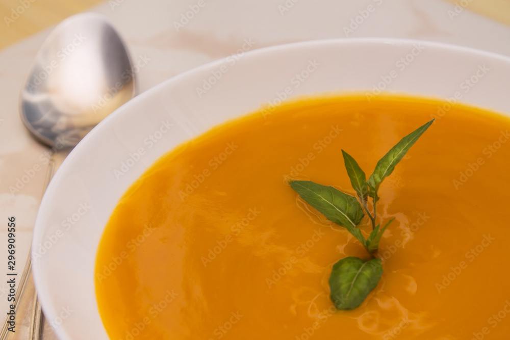 Pumpkin soup close up view, diet concept Pumpkin soup close up view, diet concept