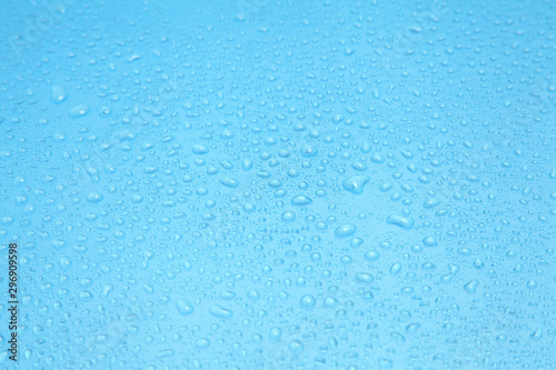 Close up water drops on blue background, Water drop in macro photography