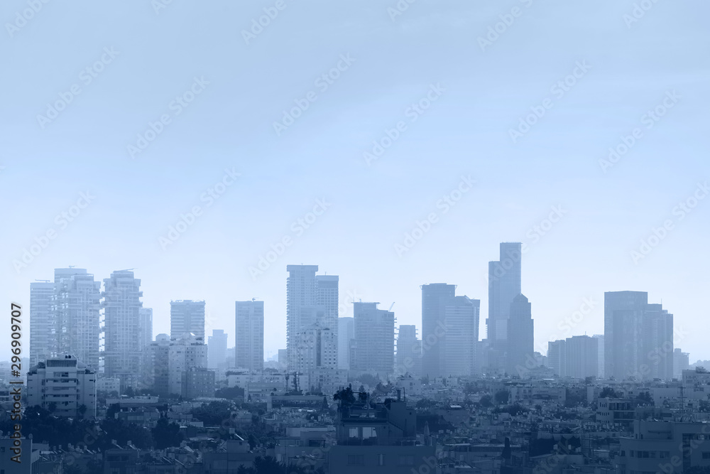 Blue tone city scape. Cityscape, modern building on a blue background. City blurred morning abstract background. Dawning.   