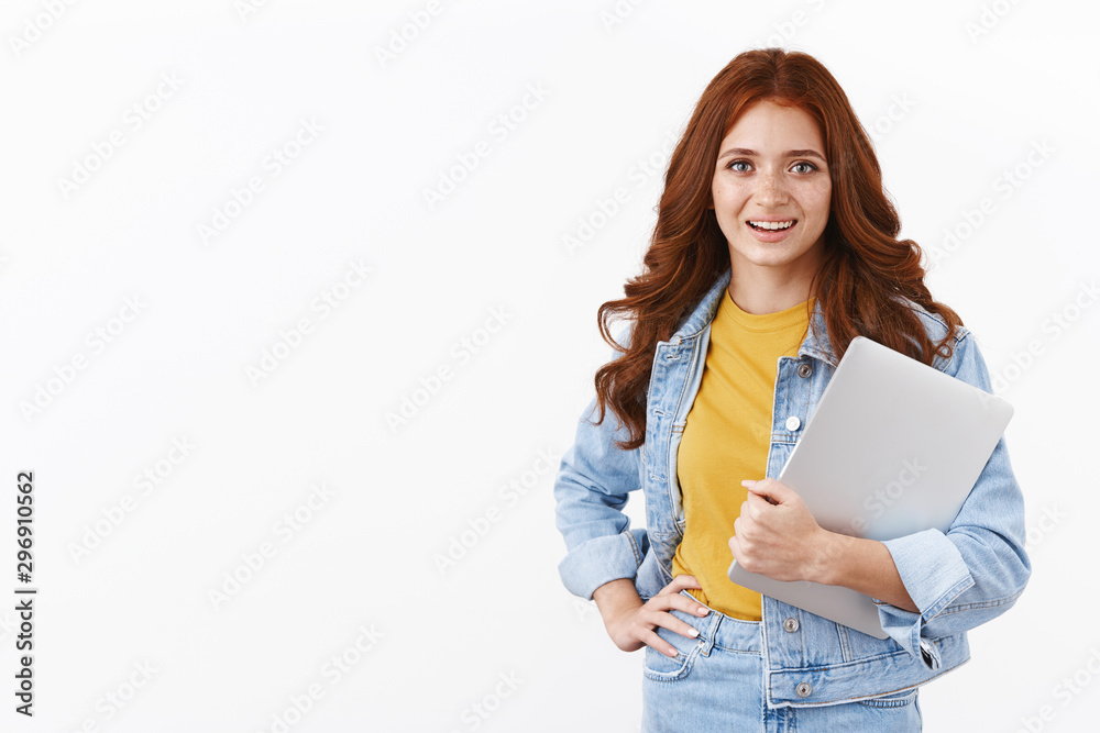 Ambitious cute female student work remote freelance to pay tuiton, hold laptop in arm, put hand on waist professional confident pose, smiling motivated, head to cafe work, stand white background Ambitious cute female student work remote freelance to pay tuiton, hold laptop in arm, put hand on waist professional confident pose, smiling motivated, head to cafe work, stand white background