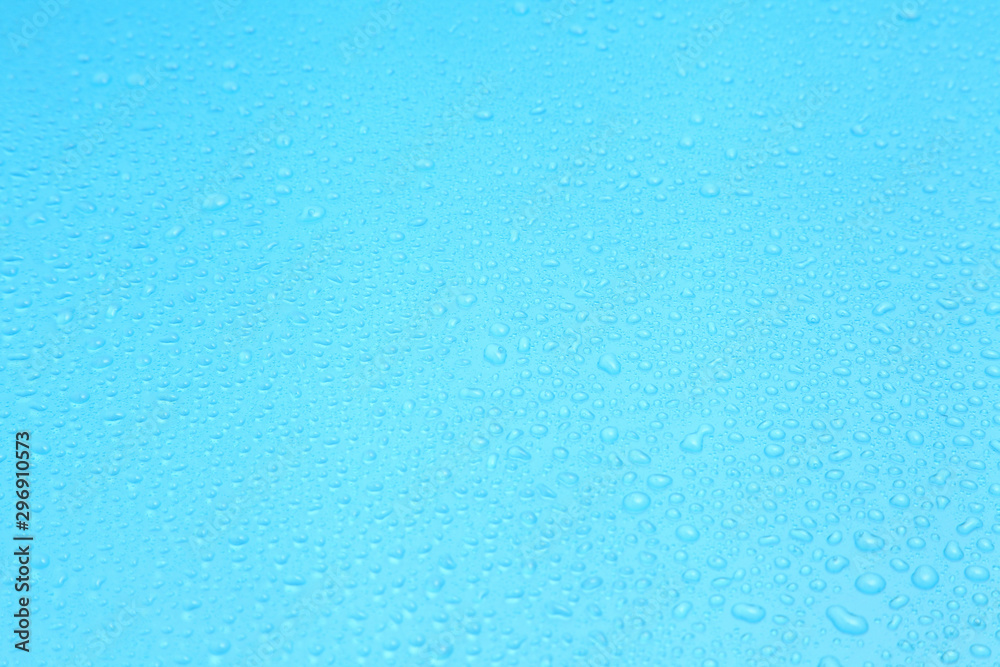 Close up water drops on blue background, Water drop in macro photography Close up water drops on blue background, Water drop in macro photography
