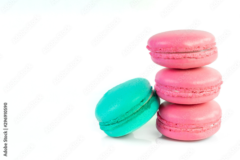 Fototapeta premium White background of colorful macaroons and copy space.